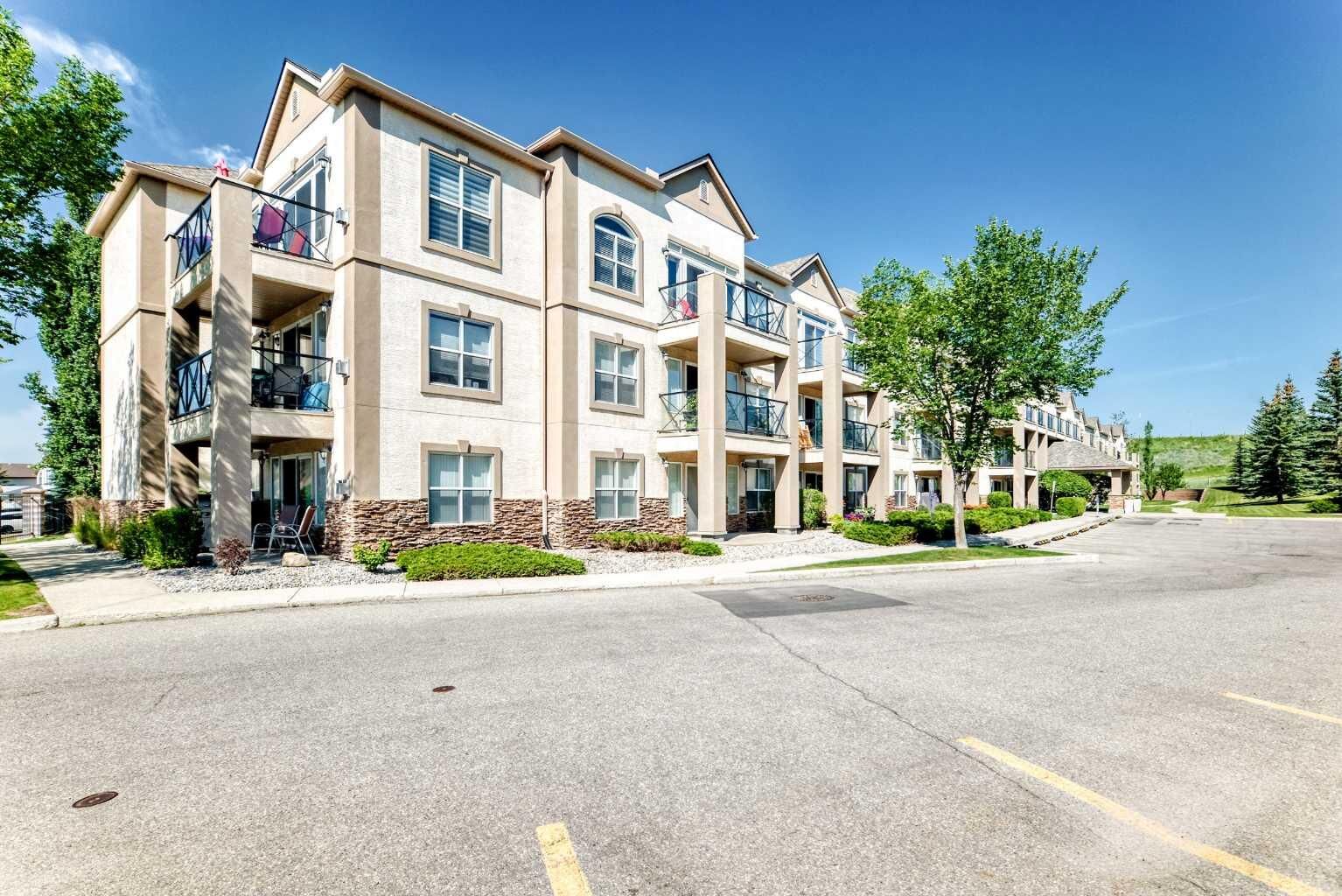 Property Photo: 303 Arbour Crest Drive NW 2215 AB T3G 5G4