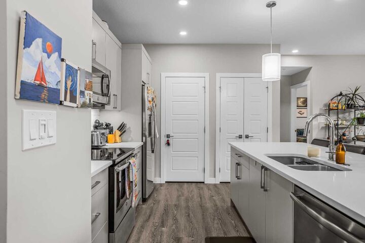 Property Photo: 106 Stewart Creek Rise 117 AB T1W 0N3