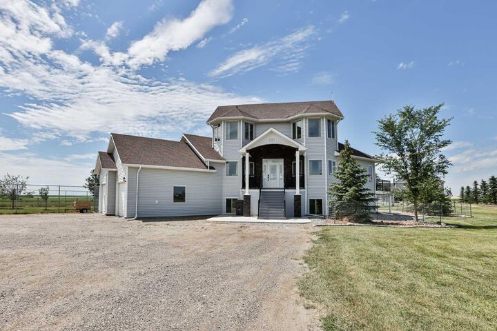Property Photo: 406 Meadow Lark Drive AB T1J 4R9