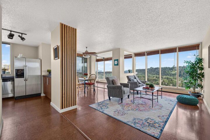 Property Photo: 145 Point Drive NW 1607 AB T3B 4W1