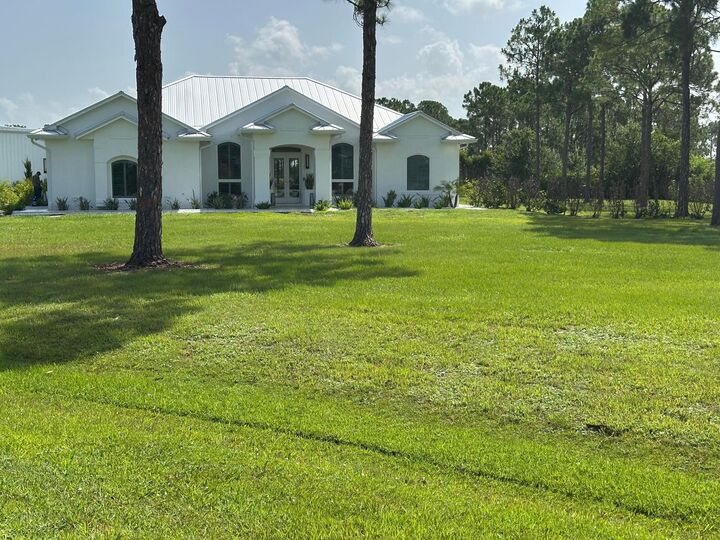 Property Photo: 12374 Grumman Way FL 34987