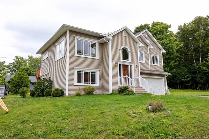 Property Photo:  75 Whisperwood Drive  NB E3C 0J8 