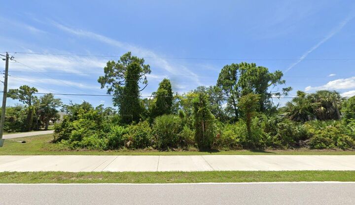 Property Photo: 10163 &Amp10171 Hallendale Drive FL 33981