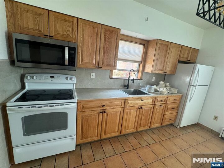 Property Photo: 442 Ridge Road 1R NJ 07071