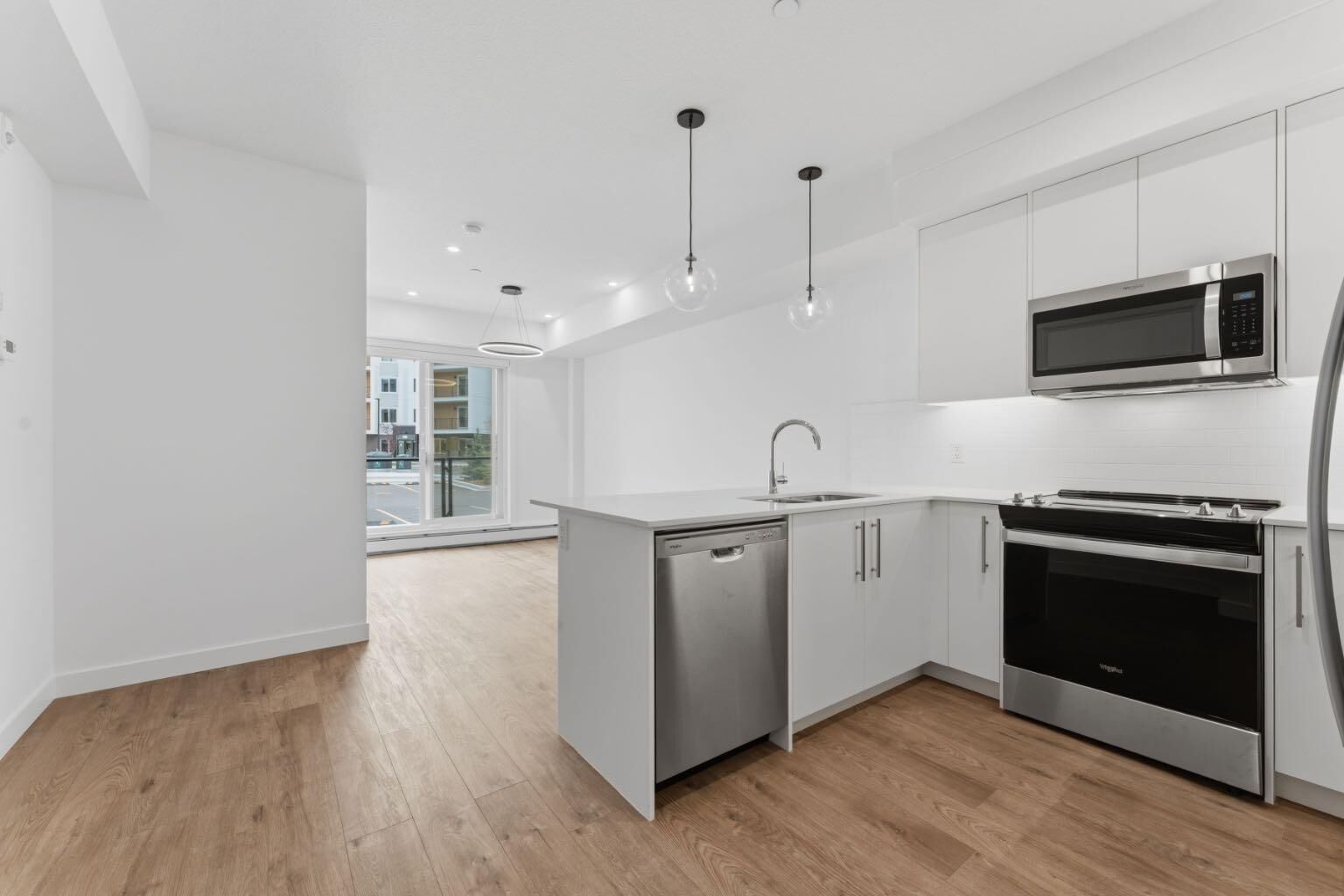 Property Photo: 265 Wolf Willow Boulevard SE 2110 AB T2X 6P9
