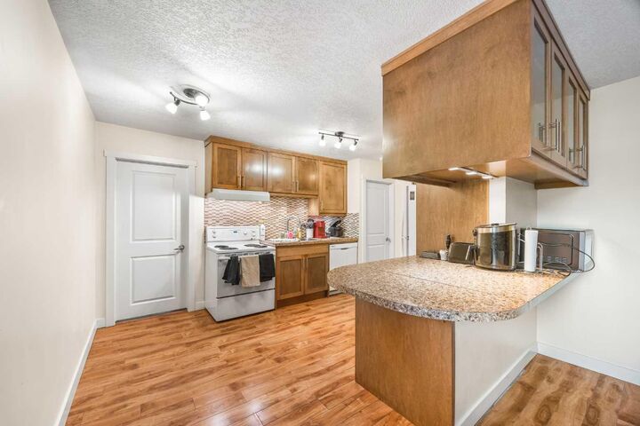 Property Photo: 3103 Blakiston Drive NW 102 AB T2L 1L7