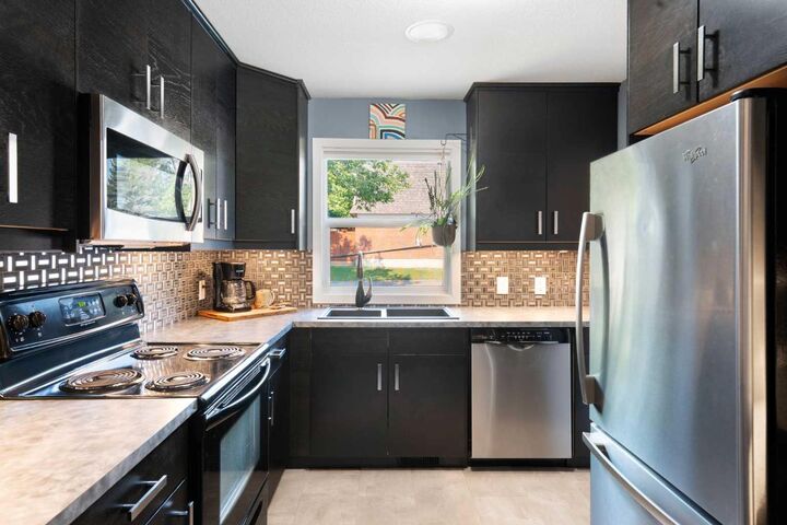 Property Photo: 330 Canterbury Drive SW 90 AB T2W 1H6