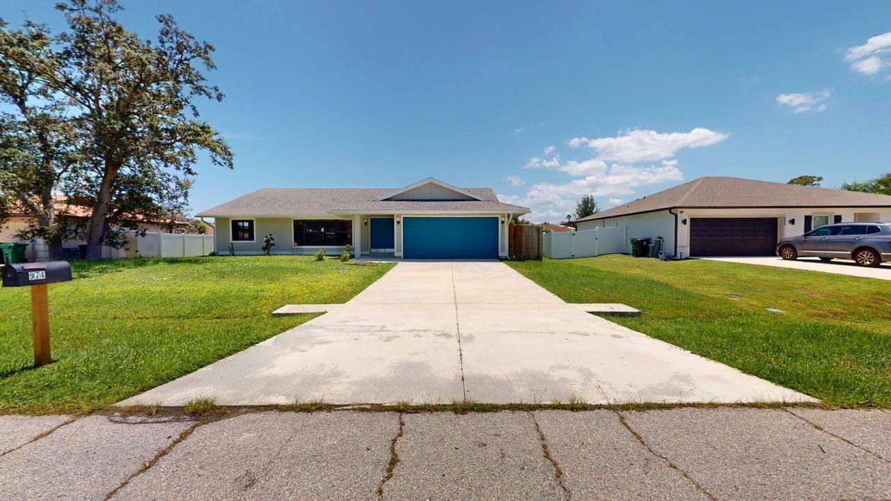 Property Photo:  974 SE Belfast Avenue  FL 34983 