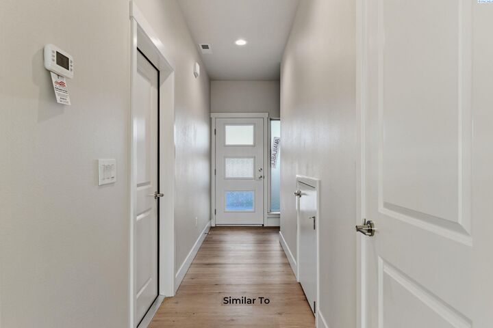Property Photo: 728 Honeylicious St. WA 99352