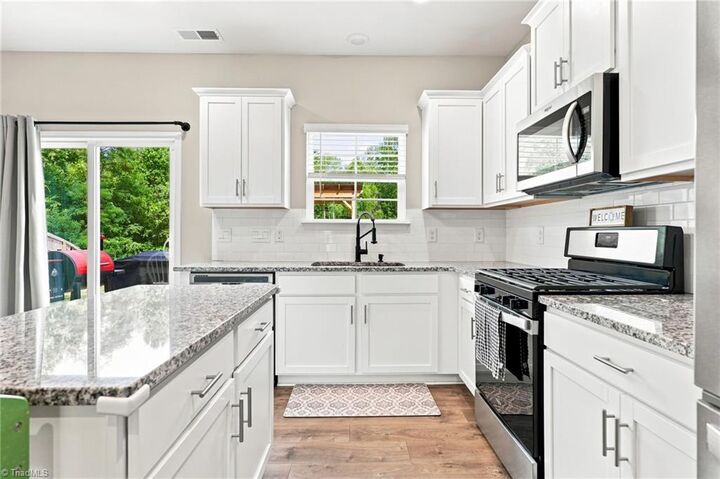 Property Photo: 6826 Bellawood Drive NC 27370