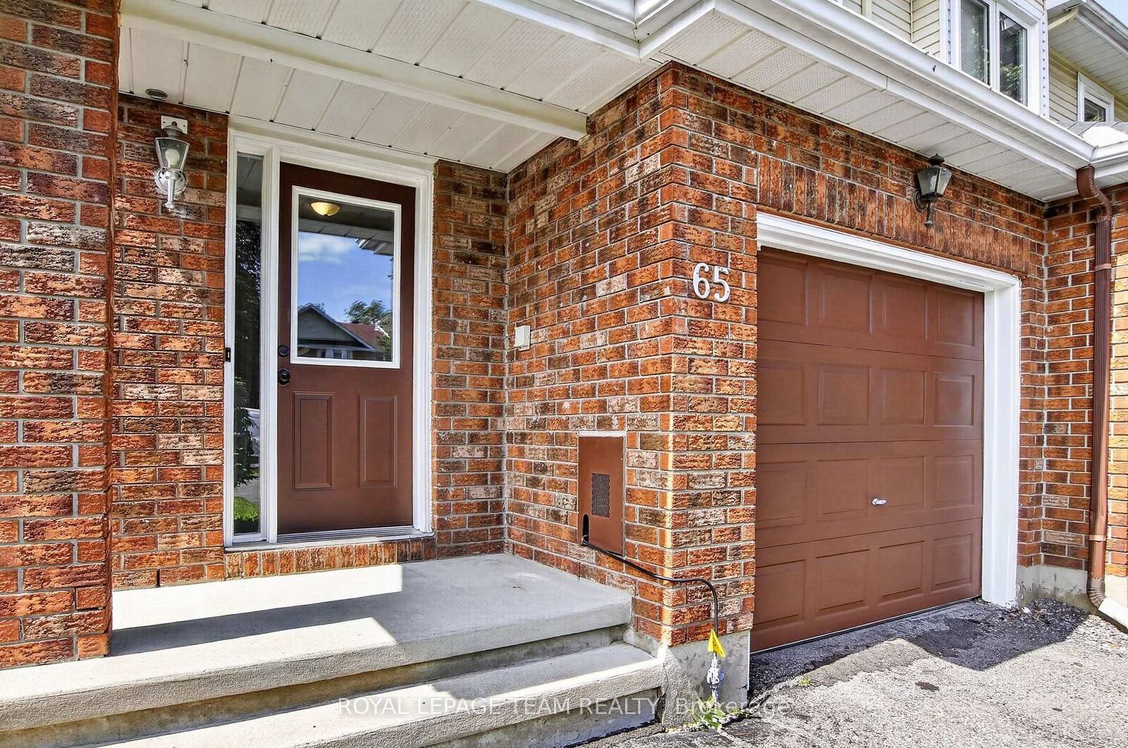 Property Photo: 65 Woodpark Way ON K2J 4C6