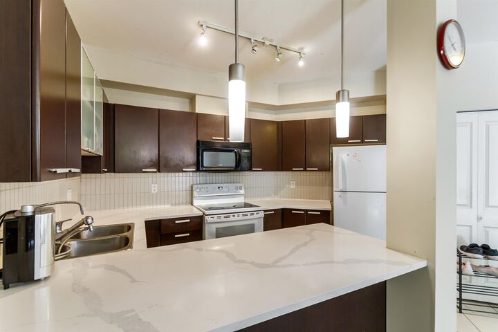 Property Photo: 10499 University Drive 301 BC V3T 0A4