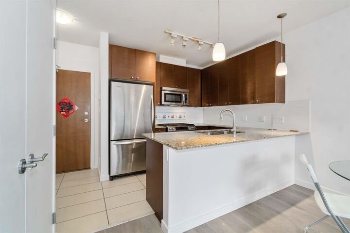 Property Photo: 7360 Elmbridge Way 502 BC V6X 0A5