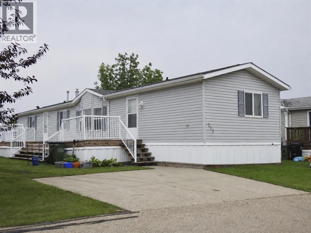 Property Photo:  218 Oak Wood Drive Northwest  AB T6P 0A4 