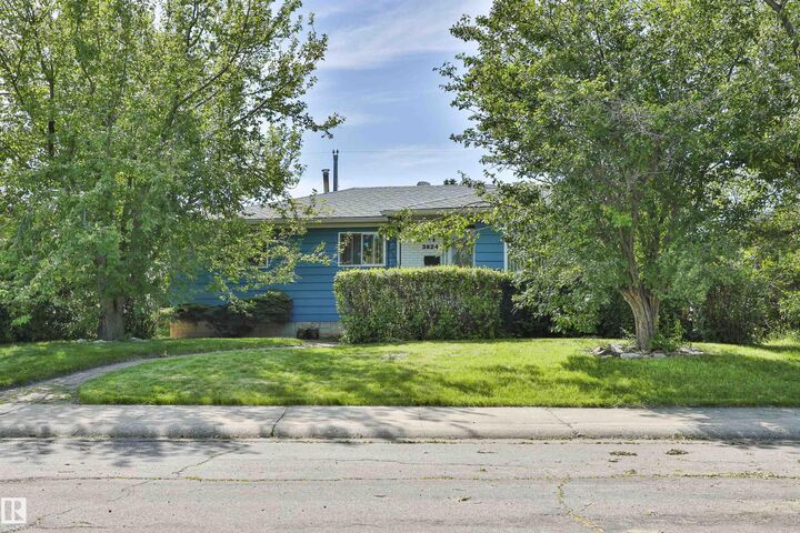 Property Photo:  3824 111B Street NW  AB T6J 1H5 