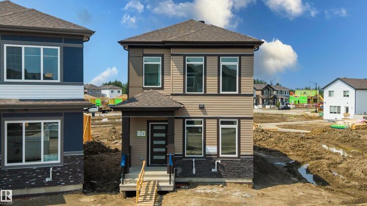 Property Photo: 1528 209 Street NW AB T6M 3N8