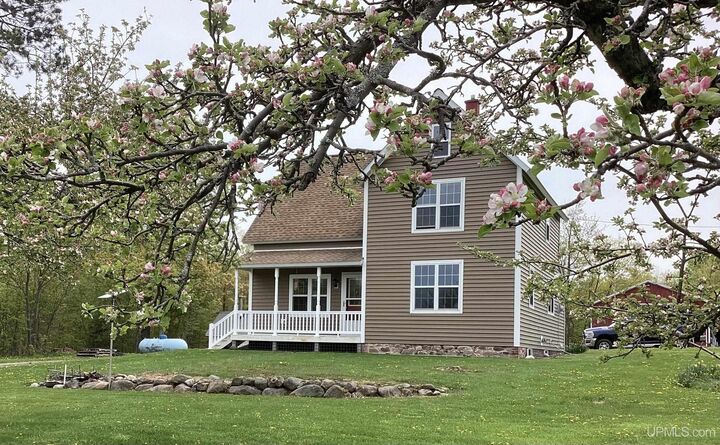 Property Photo:  24551 Upper Point Mills Road  MI 49930 