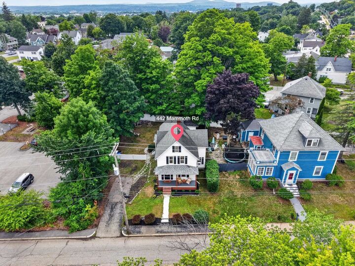Property Photo:  442 Mammoth Road  NH 03109 