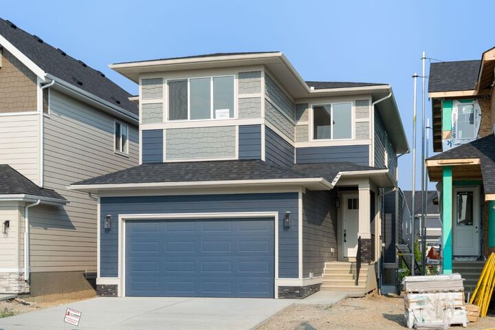 Property Photo: 112 Sunrise Heath AB T4C 3C5