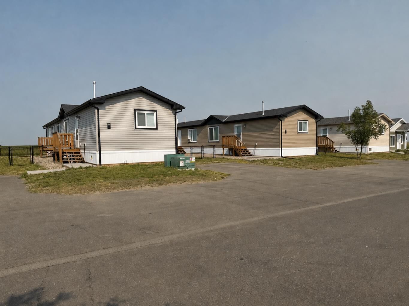 Property Photo: 6, 10, 14 Meadows Crescent AB T1G 0G7