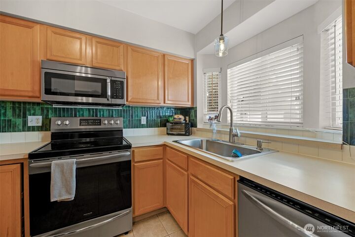 Property Photo:  459  Queen Avenue NE 303  WA 98056 