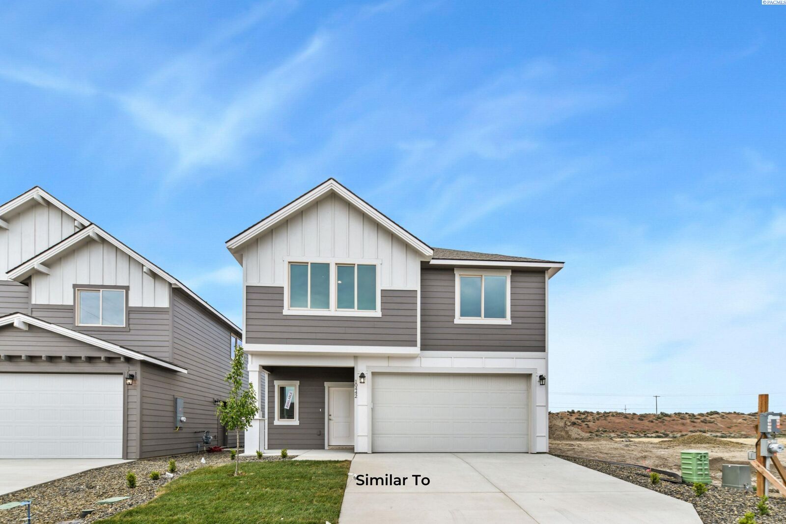 Property Photo:  734 Honeylicious St.  WA 99352 