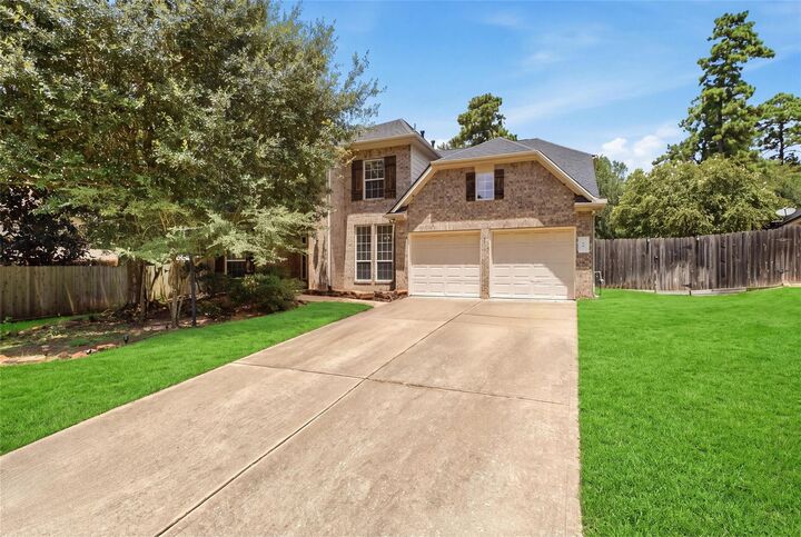 Property Photo: 58 N Scribewood Circle TX 77382