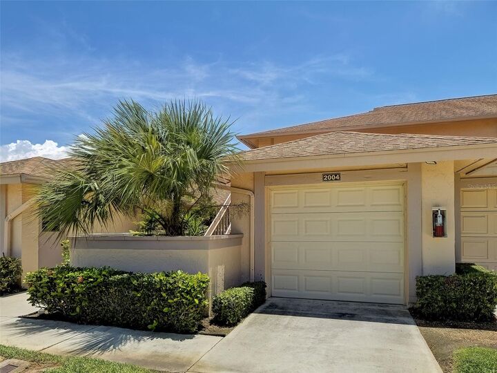 Property Photo:  2004 Longpointe Circle E2  FL 34293 