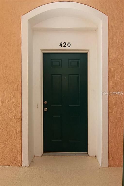 Property Photo:  13548 Turtle Marsh Loop 420  FL 32837 