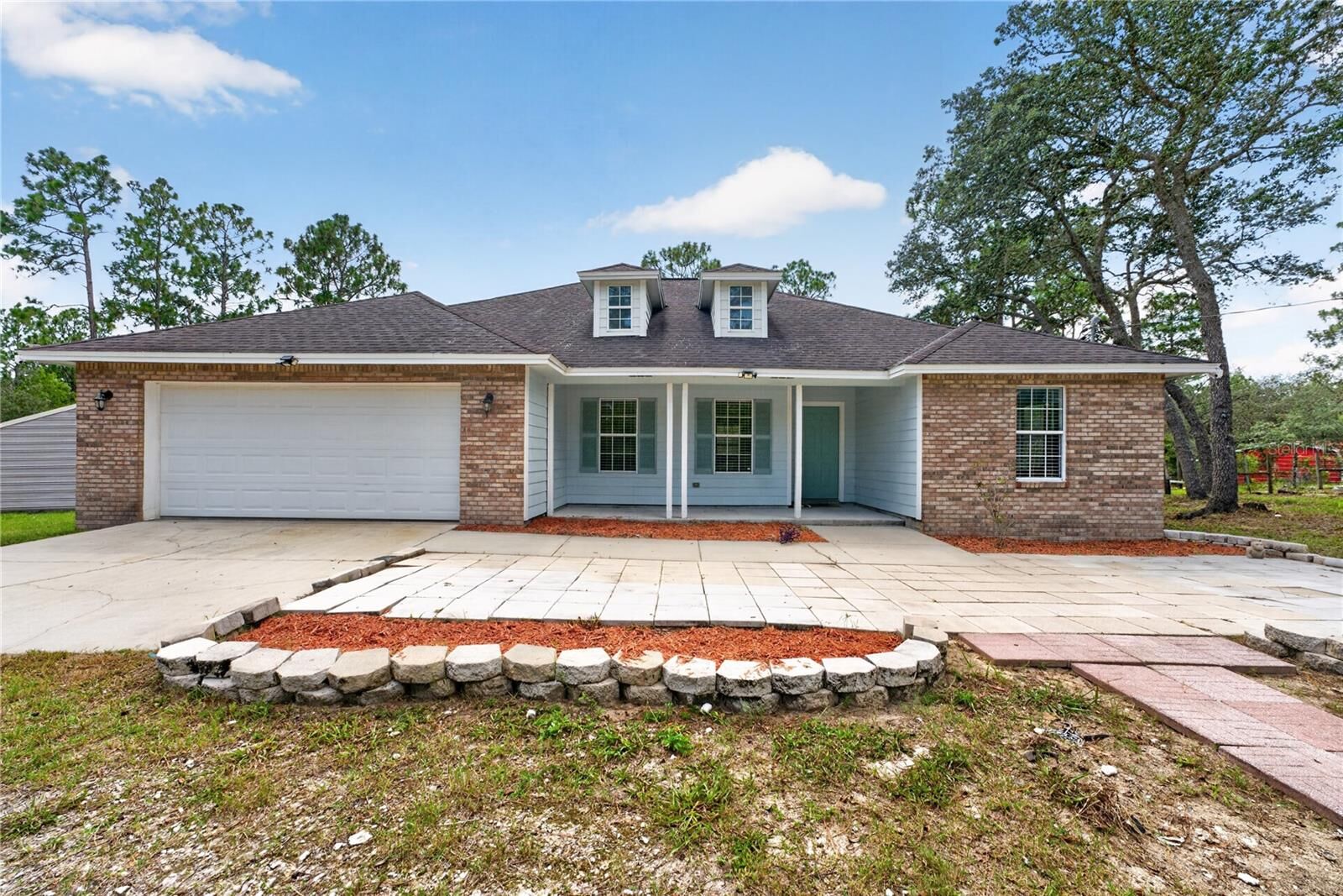 Property Photo: 230 SE 150th Avenue FL 32696