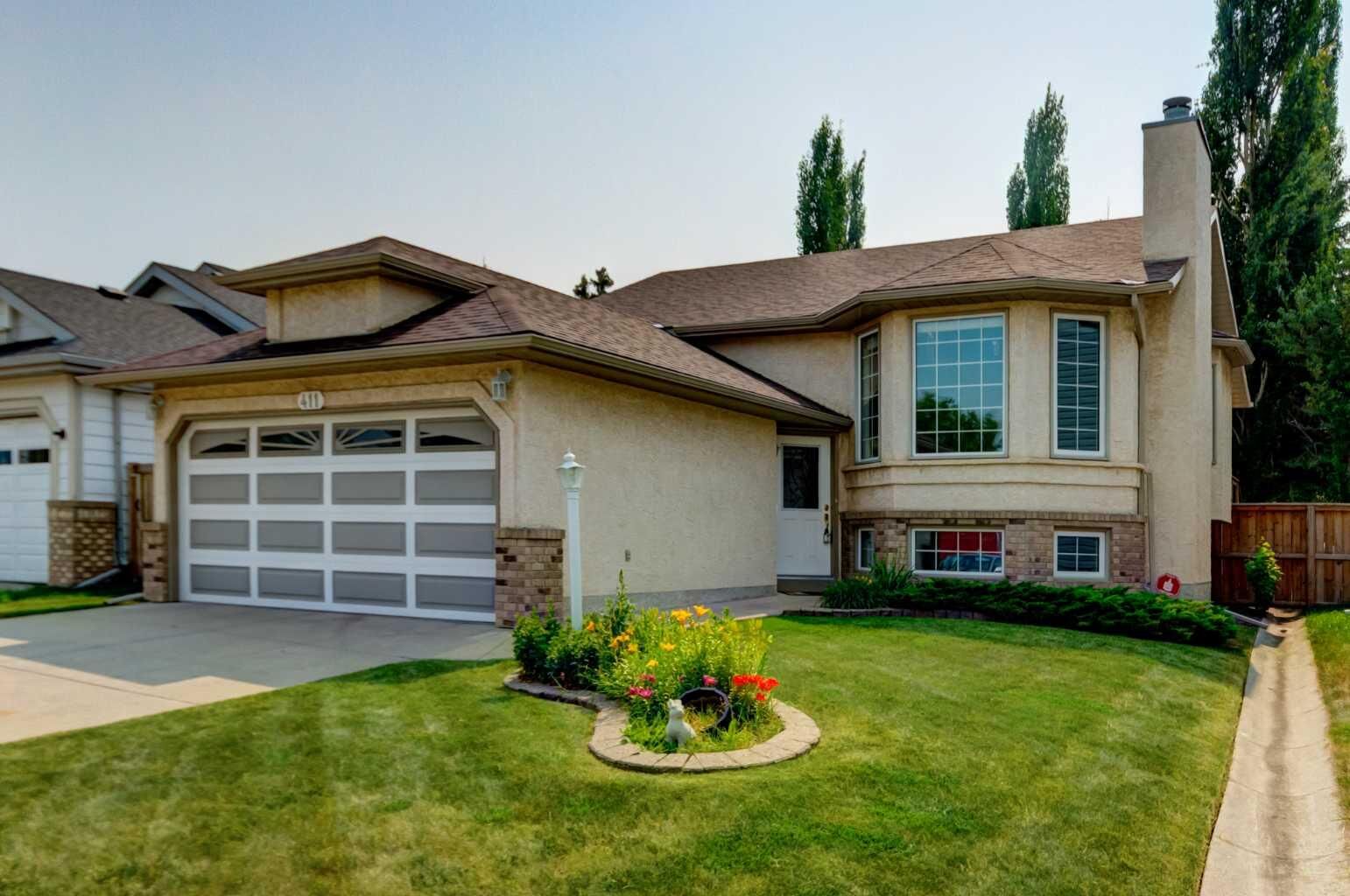 Property Photo:  411 Shawinigan Drive SW  AB T2Y 3A2 