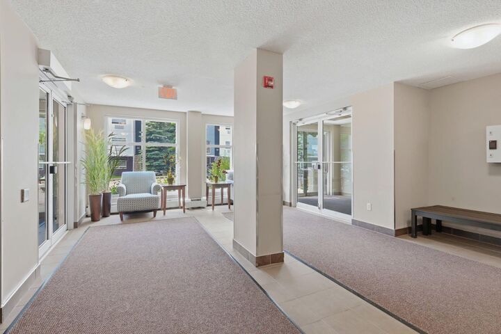 Property Photo:  11811 Lake Fraser Drive SE 5605  AB T2J 7J4 