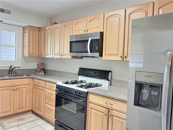 Property Photo: 650 East Greenwich Avenue 7109 RI 02893