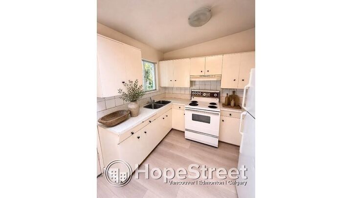 Property Photo:  3432 Raleigh Street Main  BC V3B 4P8 
