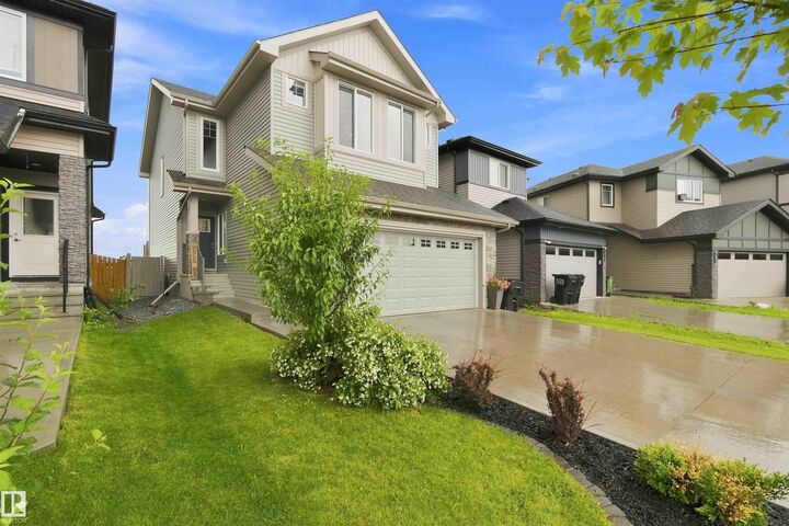 Property Photo: 7608 Creighton Place SW AB T6W 3Z6