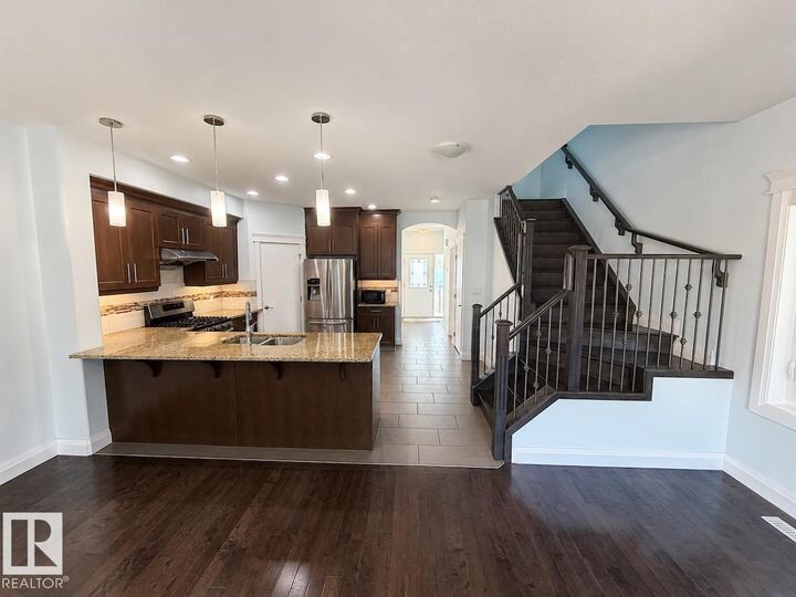 Property Photo:  12913 124 Street NW Upper  AB T5L 0P6 