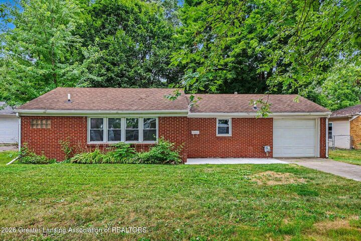 Property Photo:  1897 Hall Street  MI 48842 