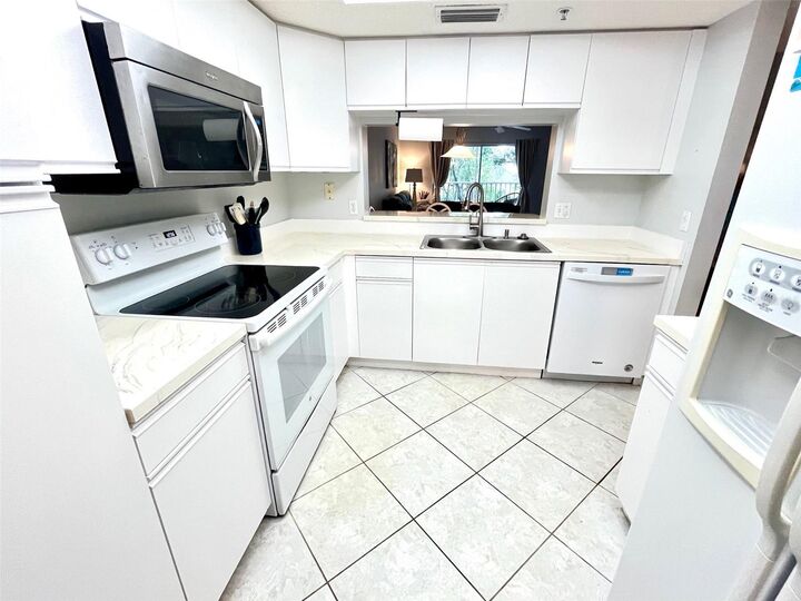 Property Photo:  6507 Stone River Road 210  FL 34203 