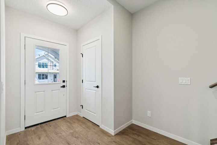 Property Photo: 78 Bluerock Hill SW AB T2Y 0V6