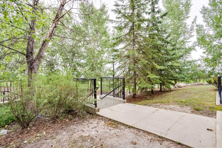 Property Photo:  204 Sparrow Hawk Drive 2103  AB T9K 0P1 