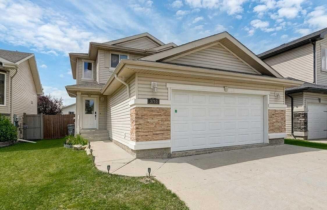 Property Photo:  8710 88B Street  AB T8X 0G7 