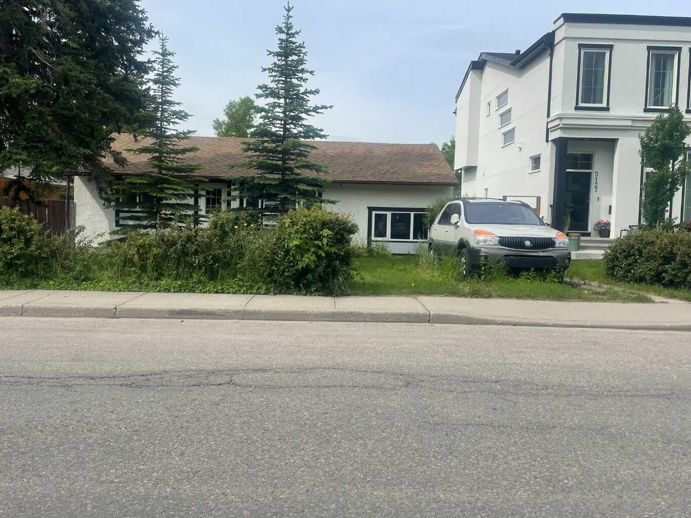 Property Photo:  5123 19 Avenue NW  AB T3B 0T1 