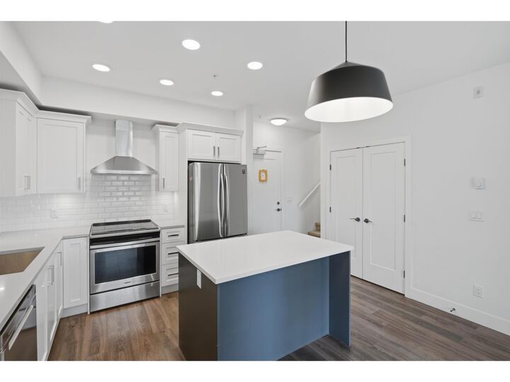 Property Photo:  33568 George Ferguson Way 302  BC V2S 0M3 