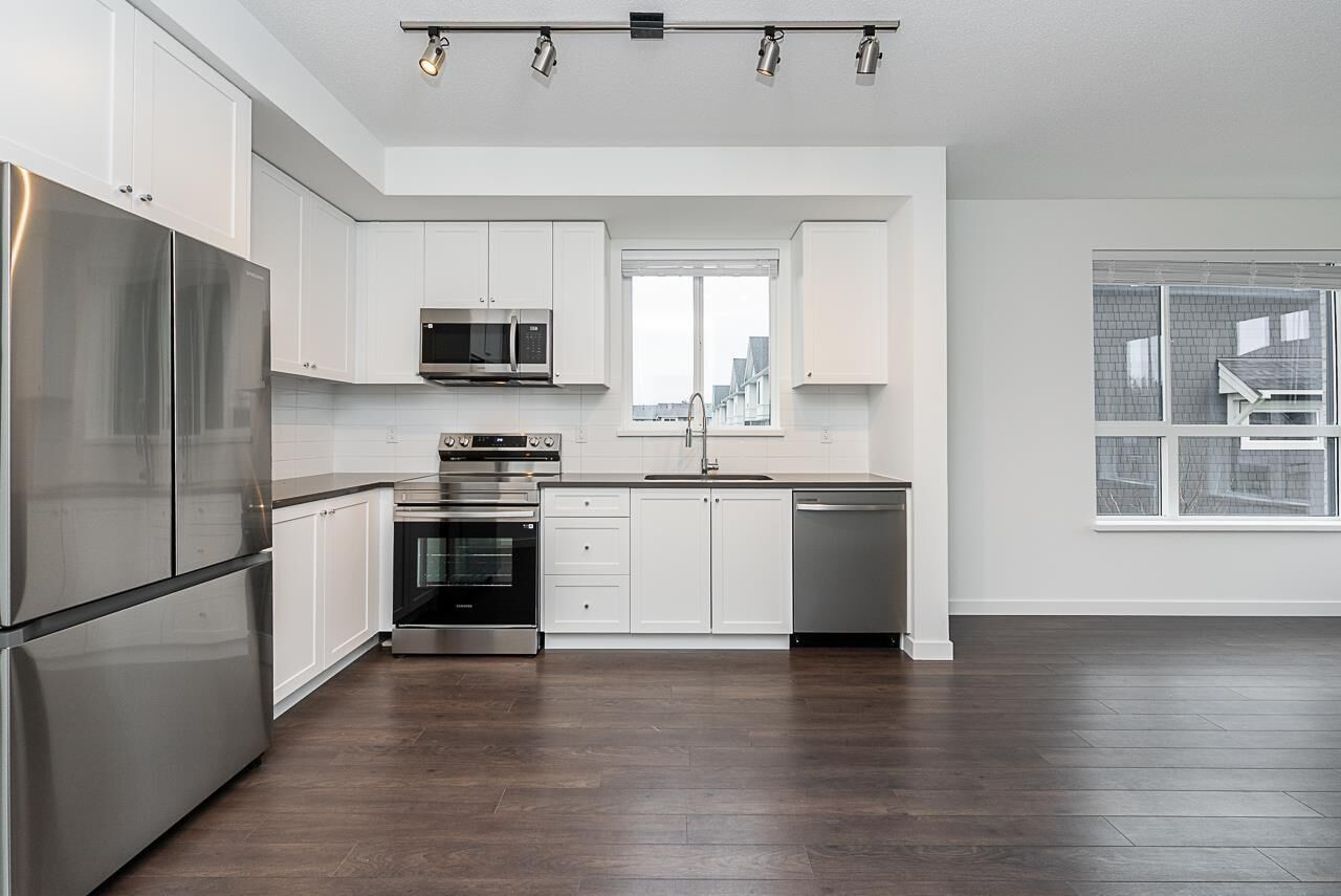 Property Photo:  15738 85 Avenue 214  BC V4N 6Y1 