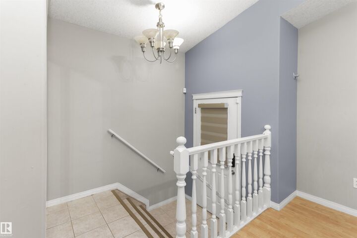 Property Photo:  11517 83 Street NW  AB T5B 2Y6 