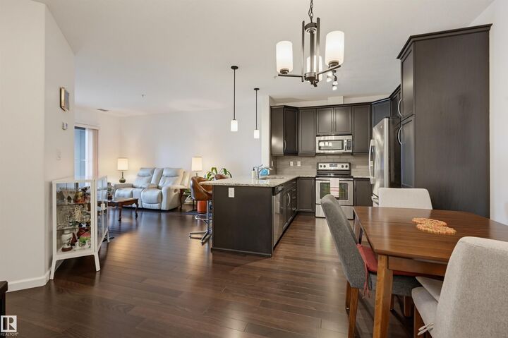 Property Photo: 6083 Maynard Way NW 110 AB T6R 0S5