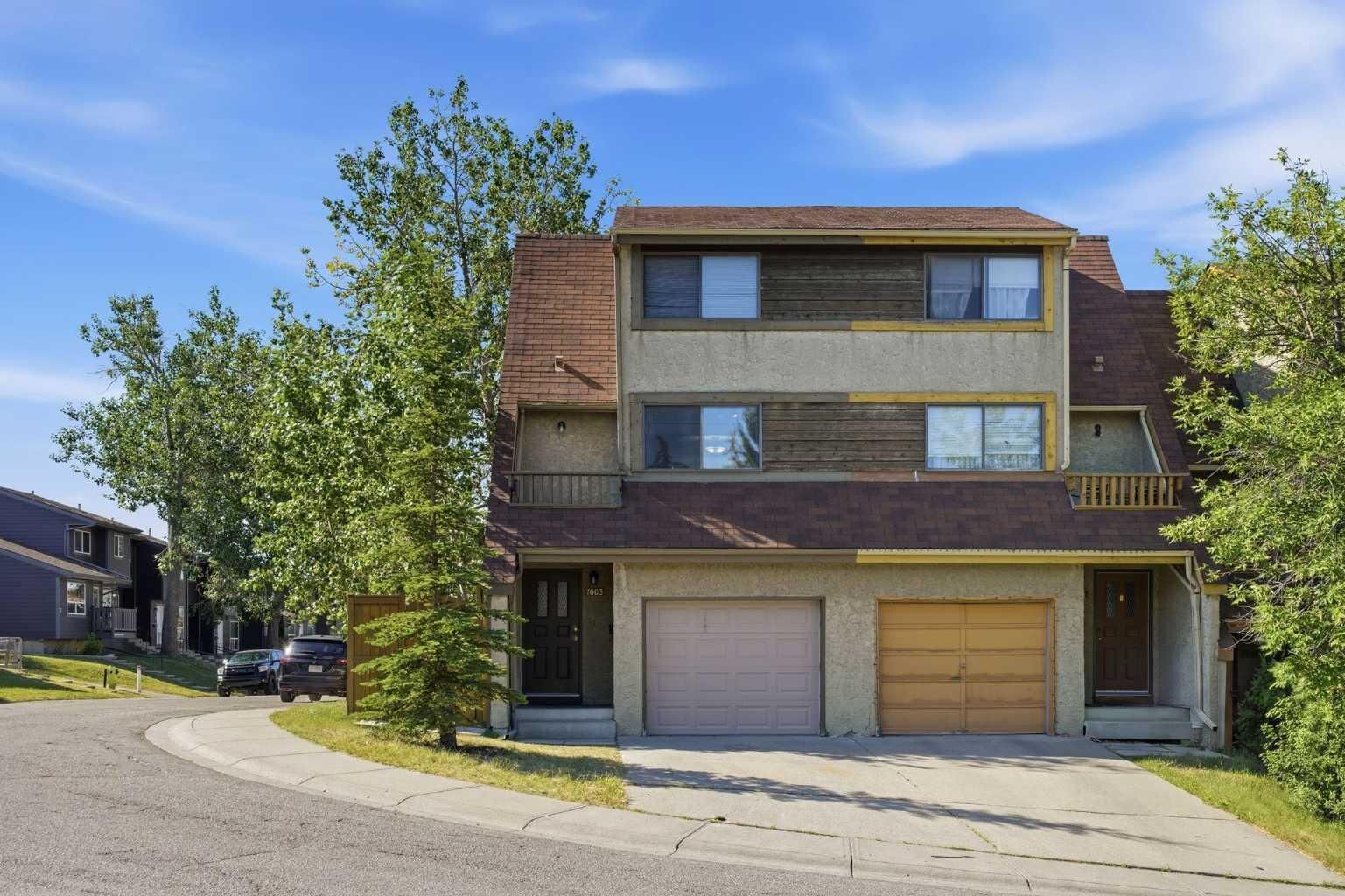 Property Photo: 7003 Ranchero Road NW AB T3G 1J6