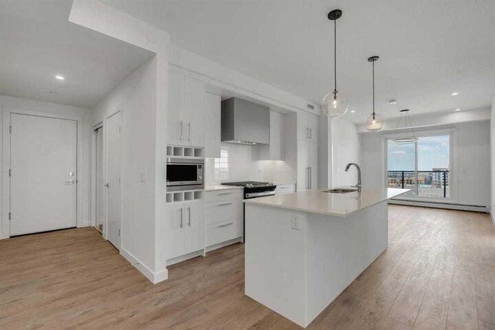 Property Photo: 8230 Broadcast Avenue SW 609 AB T3H 6M1