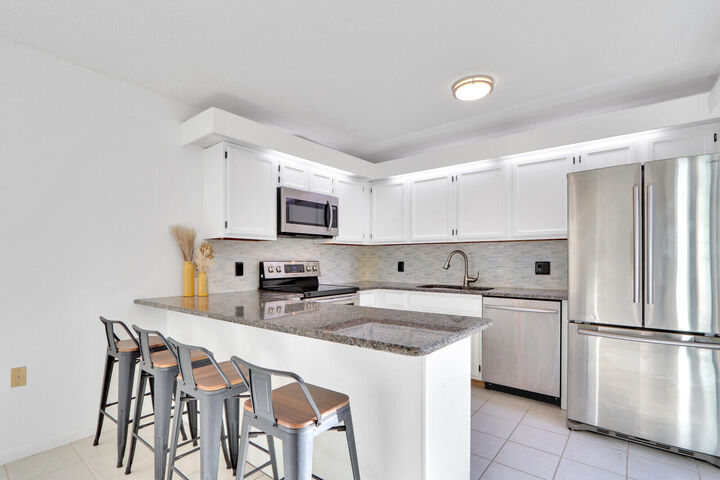 Property Photo:  5633 SE Windsong Lane  FL 34997 