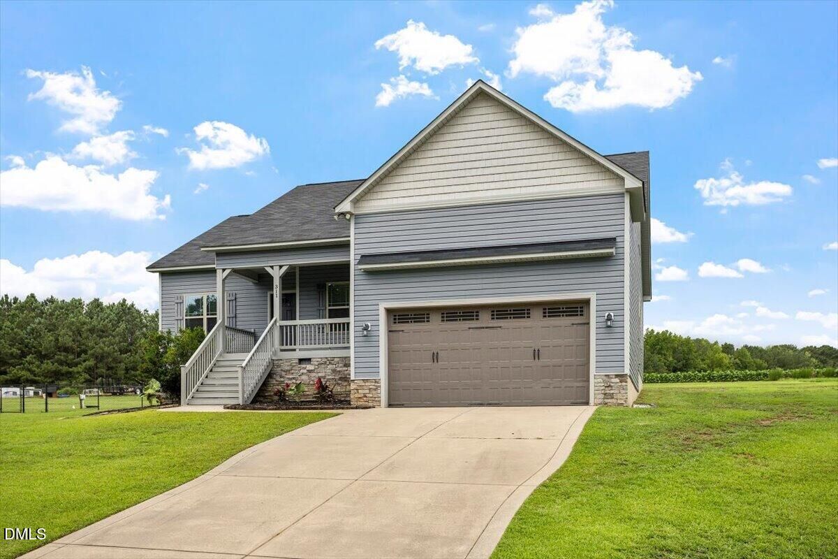 Property Photo:  311 Cotton Mill Drive  NC 27597 